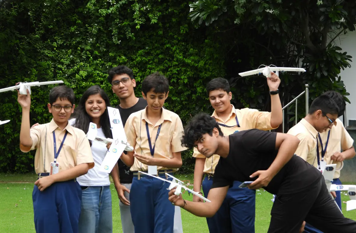 Exxler STEM event - students collaborating on robotics build