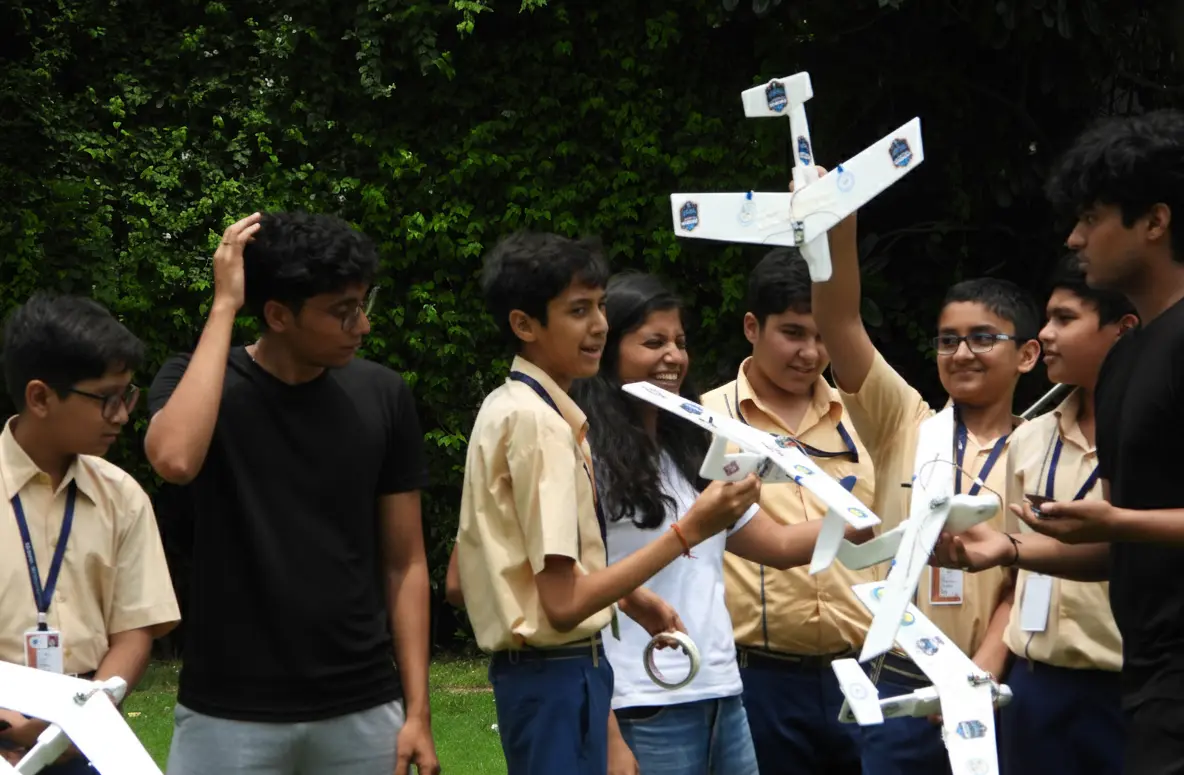 Students showcasing projects at Exxler exhibition